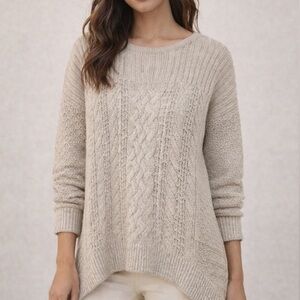 Cozy-chic neutral knit sweater with a subtle allover sparkle cable knit detail
